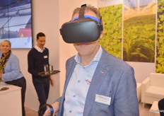 Henk Meulstee, Flier Systems with the VR-glasses. It gave visitors of this booth a really nice look of the Flier installations in practice